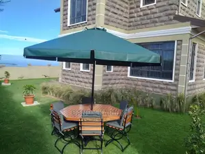 6 Seater Outdoor Set With Padded Seat and an Umbrella
