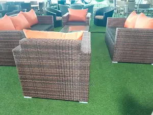 7 Seater Outdoor Sofa With Orange Cushions Plus a Table