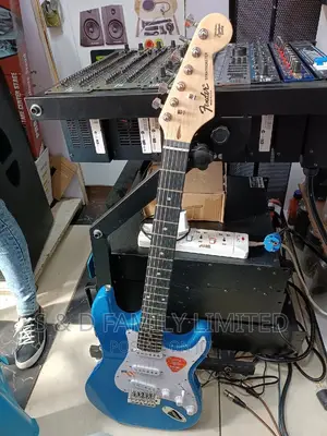 Blue Fender Rythmn Electric Guitar