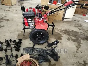 Heavy Duty Power Tiller With Accessories.