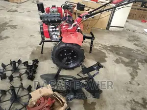 Heavy Duty Power Tiller With Accessories.