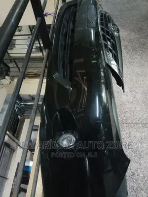 N16 Subaru Front Bumper With Grille and Fog Lights