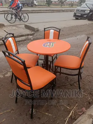 Restaurant Set Orange, White With a Table With Logo.