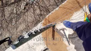 200 by 200 Electric Fence With Green Razor Wire