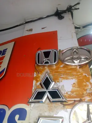 Emblem Logo Honda and Other Assorted Vehicles