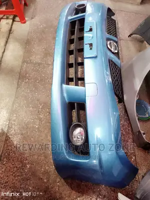 Nissan Wingroad Y12 Front Bumper Complete.