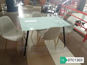 Imported Morden Dinning Table 4 Seater Top Glass