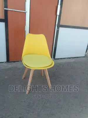 Padded White Eames Chairs