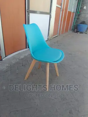 Padded White Eames Chairs