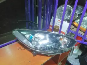 Mazda Demio 2012/2013 Non Zenon Headlight With Blue Ring