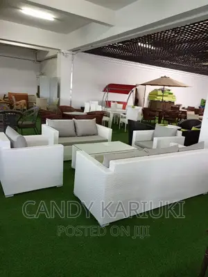 White and Grey 7 Seater Outdoor Sofa Plus a Table