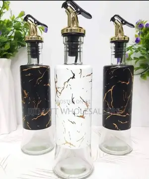 *Oil Dispenser Available in Black and White