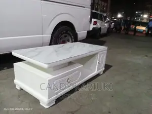 Beautiful Coffee Table With Spacious Drawers