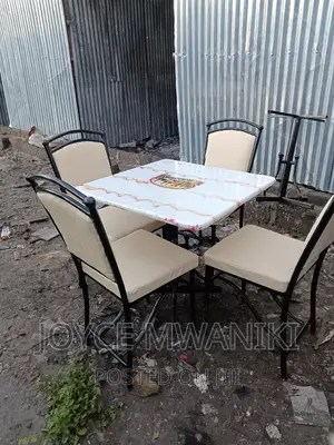 Restaurant Set of Balls Chairs and a Squre Table.
