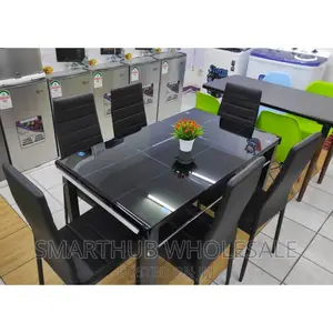 Glass 6 Seater Dining Table
 Available