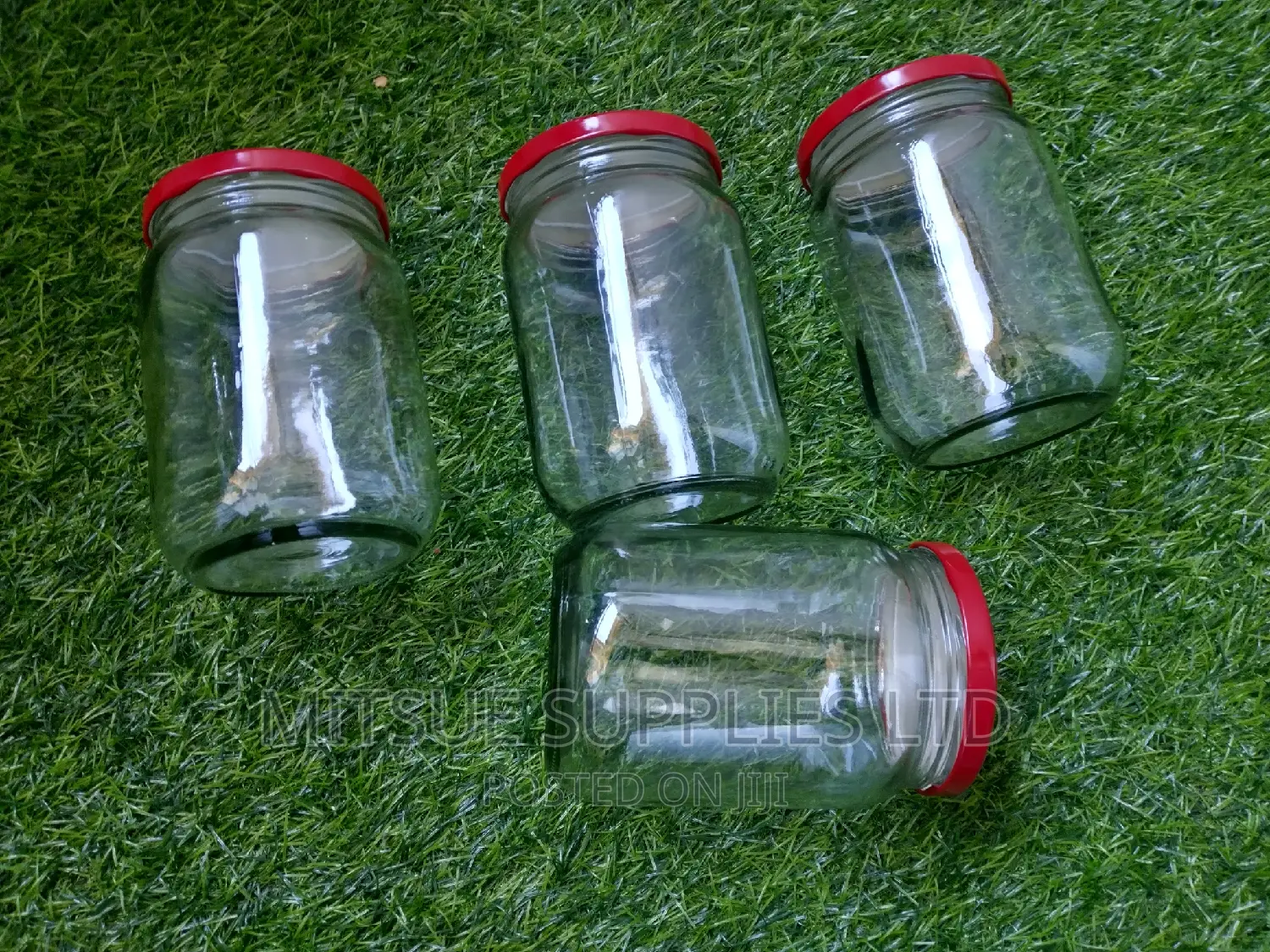 A Set of 4 Storage Jars 720ml With Airtight Red Lids