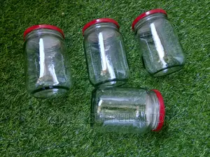 A Set of 4 Storage Jars 720ml With Airtight Red Lids