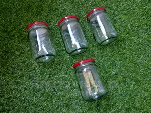 A Set of 4 Storage Jars 720ml With Airtight Red Lids