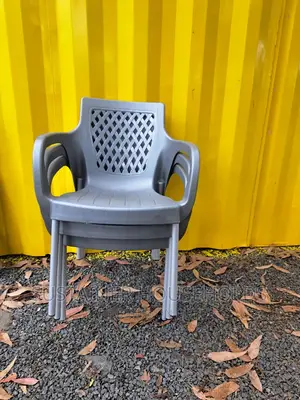 Set of Plastic Chairs and a Table
