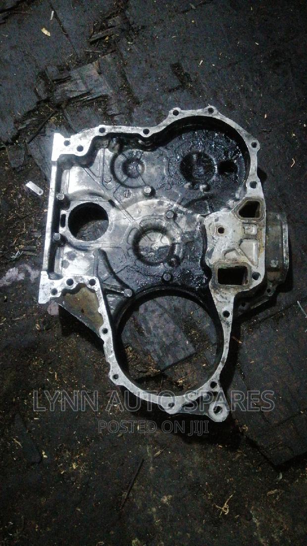 Nissan QD32 Engine Timing Cover - main view