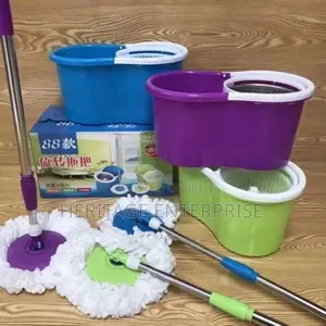 Spin Mop With Wheels and Extra Mop Cloth.