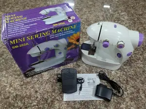 Mini Electric Sewing Machine.