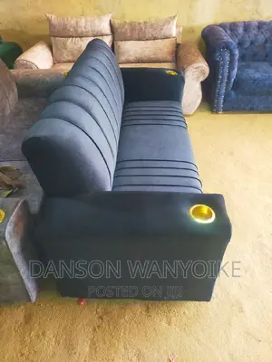 Three Seater Sofa With Cup Holders on Sale