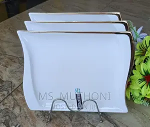 A Set of 6 Dinner Plates*