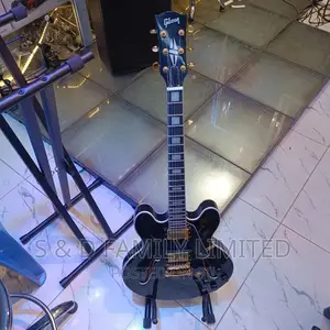 Black Gibson Les Paul Electric Guitar
