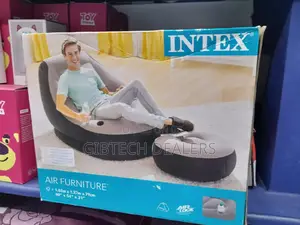 Inflatable Seat With Foot Rest and a Pump