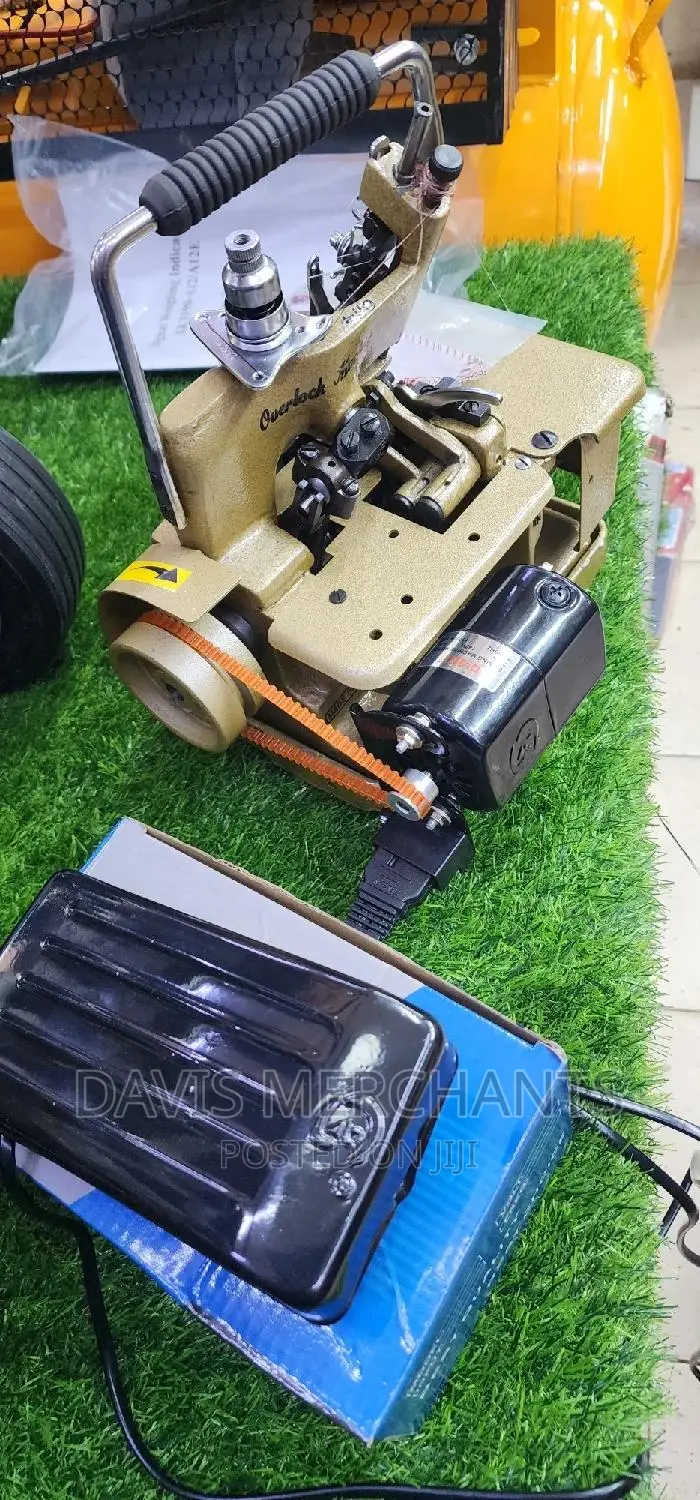 Overlock Machine Fitted With Motor and Clutch