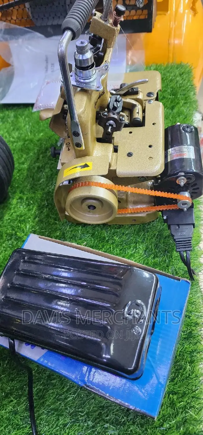 Overlock Machine Fitted With Motor and Clutch