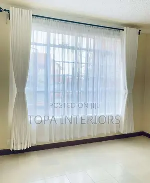 White Curtains for a Bright Interior House Decoration