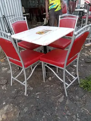4 Hotel/ Bar Seats With One Table