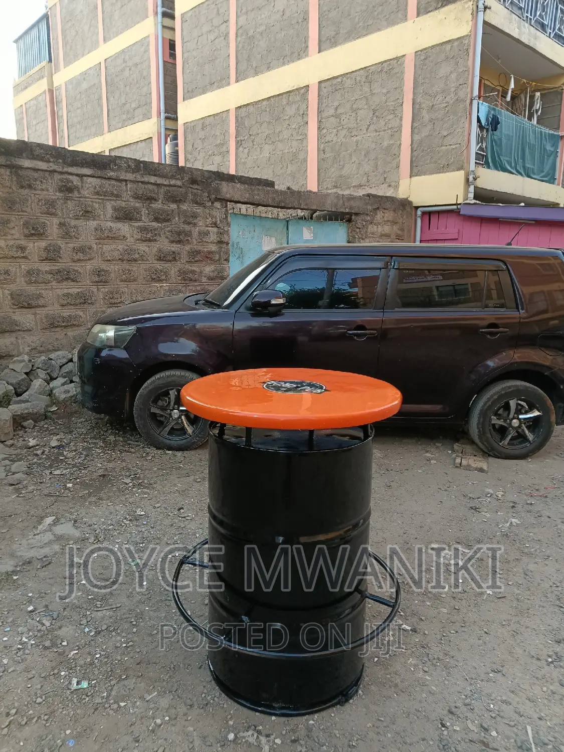 Restaurant Drum Tables, Orange Black With Logo.