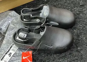 *Nike Mule Slides*
 Size:*40-45*
Price:*3500*
