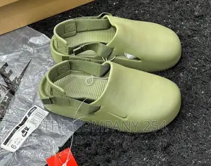 *Nike Mule Slides*
 Size:*40-45*
Price:*3500*