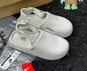 *Nike Mule Slides*
 Size:*40-45*
Price:*3500*