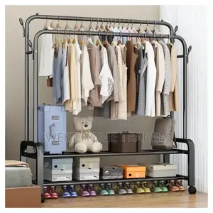 *Curved Double Clothes Rack With 2 Bottom Shelf Storage 