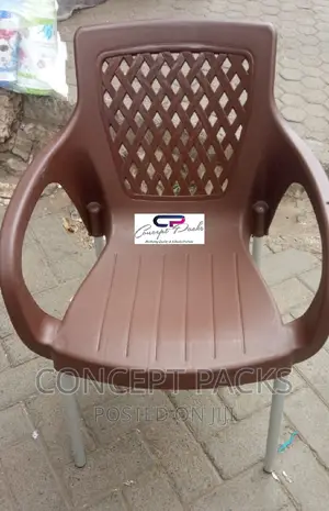 Brown Plastic Chair With Metal Tubing Legs.