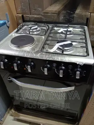 50 by 55 Saratech Cooker 3gas and 1 Electric Cooker