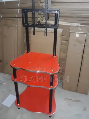 Brown Wooden Tv Stand With Tv Bracket