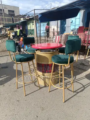 Restaurant or Bar Chairs and a Drum Table.