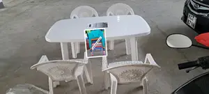 Plastic Chairs and a Table Set