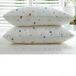 A Pair of White Fibre Pillows
