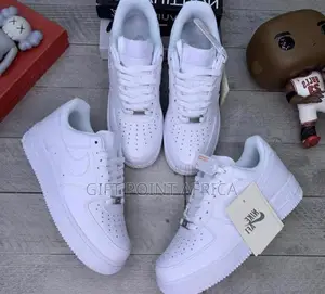 White Nike Air Force Low Cut Unisex Sneakers