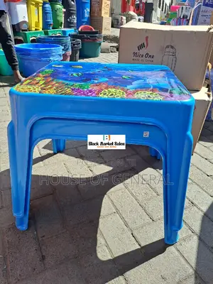 Kid Studying Plastic Table