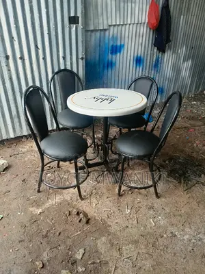 Restaurant Set, Black Chairs and a White Table 