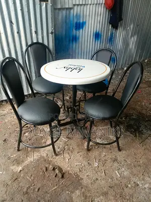 Restaurant Set, Black Chairs and a White Table 