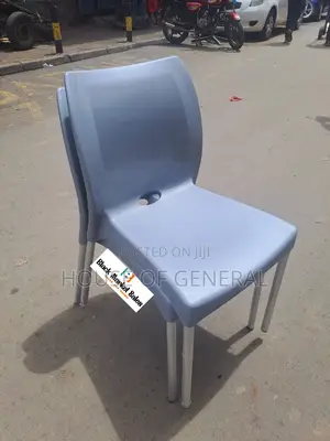 Gray Armless Plastic Chair With Metal Legs
